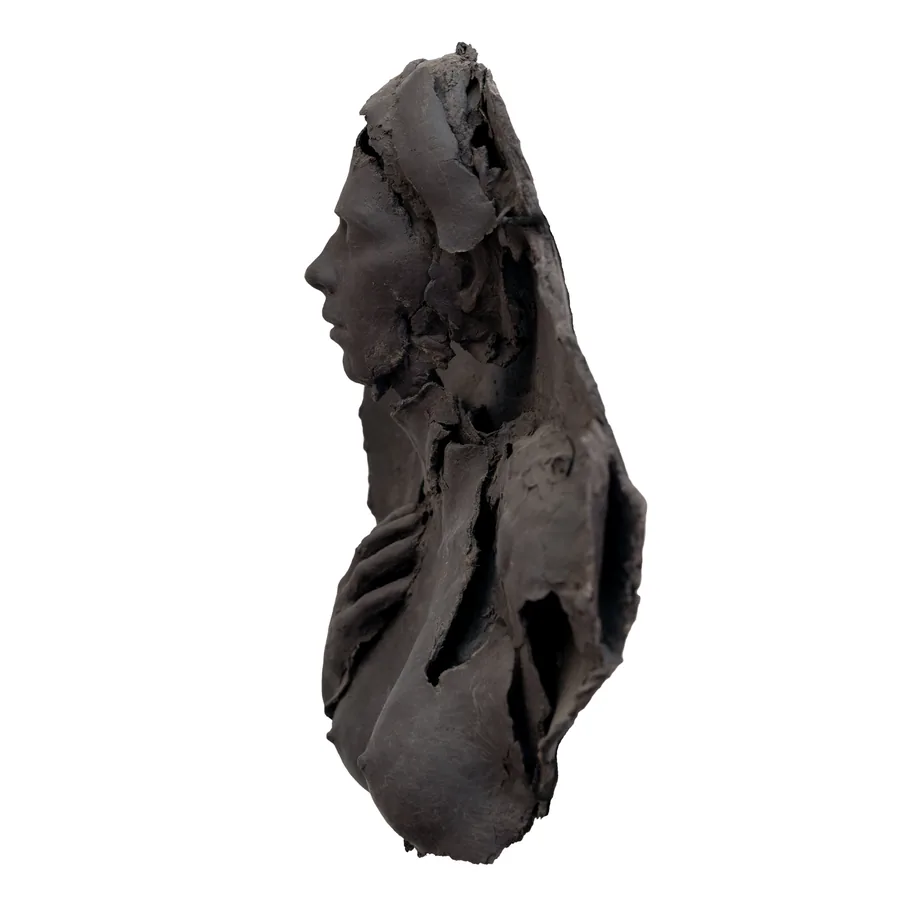 cala, black porcelain relief, side view showing the face in profile