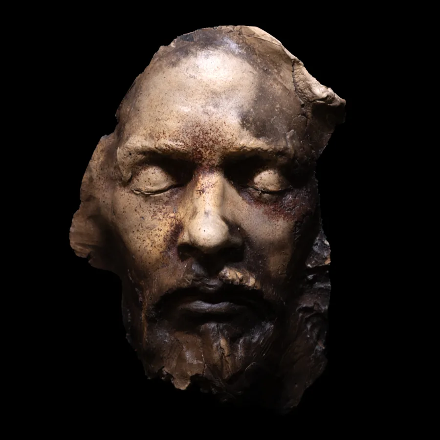 portrait study iii, smoke-fired stoneware face of a bearded man with closed eyes, front view