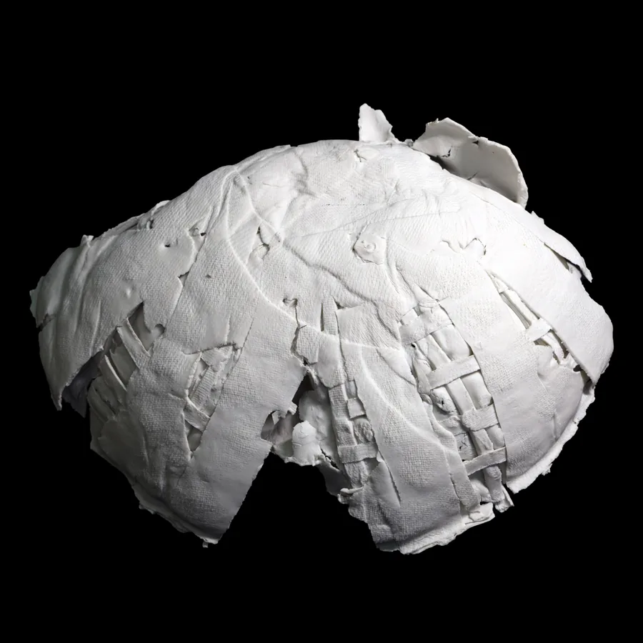veritas, the rounded outer surface of the white porcelain form, pressed with fabric texture